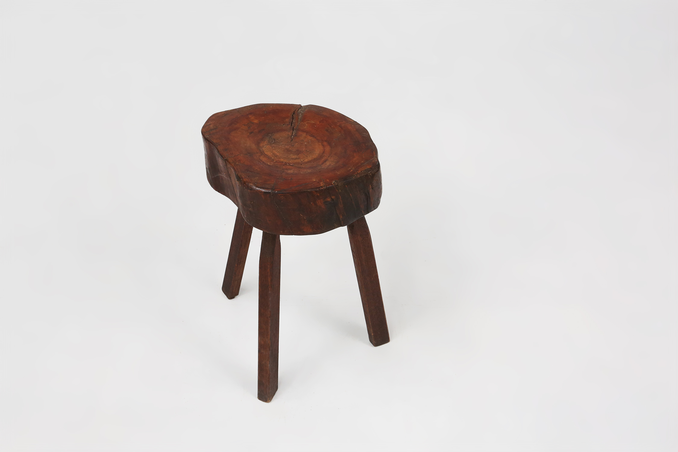 Rustic wooden tripod stool with tree trunk seat, France ca. 1900thumbnail